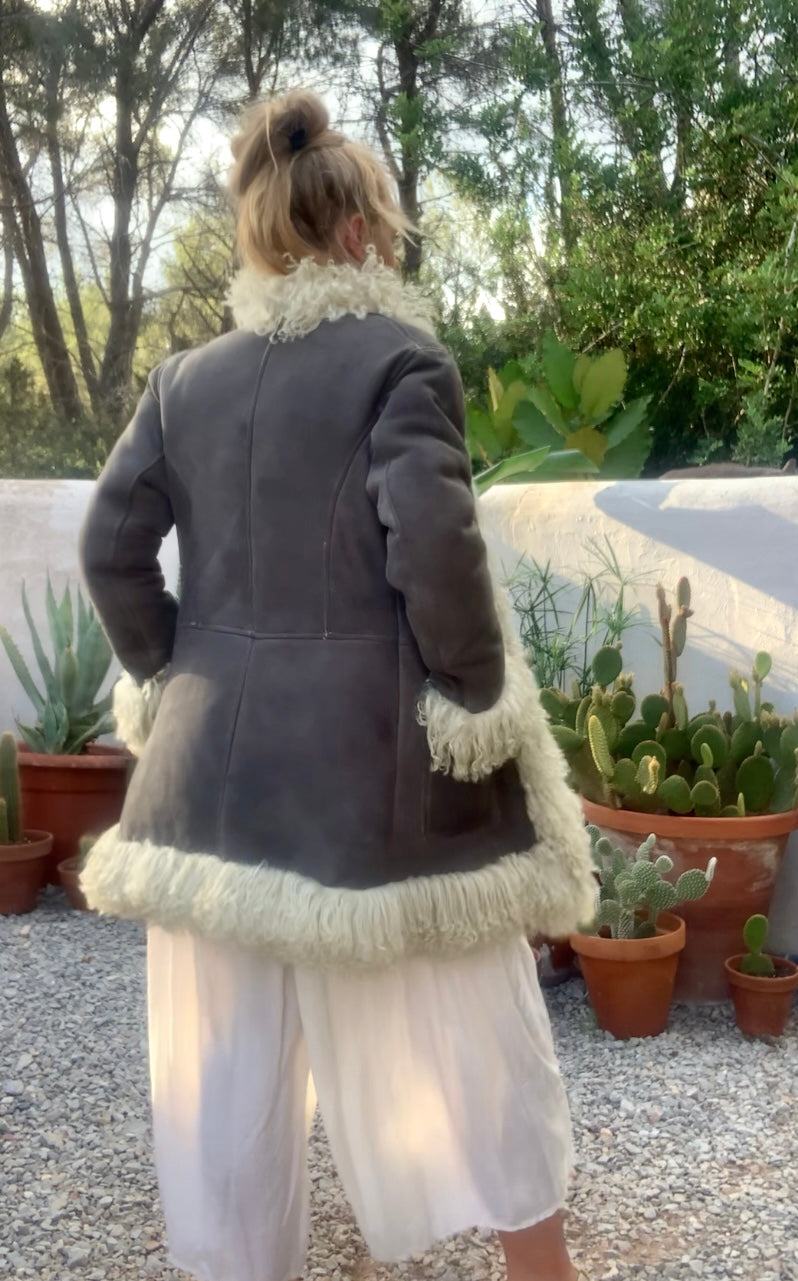 Vintage Classic 1970’s reversible Afghan sheepskin jacket has some small signs of ages some small hole’s