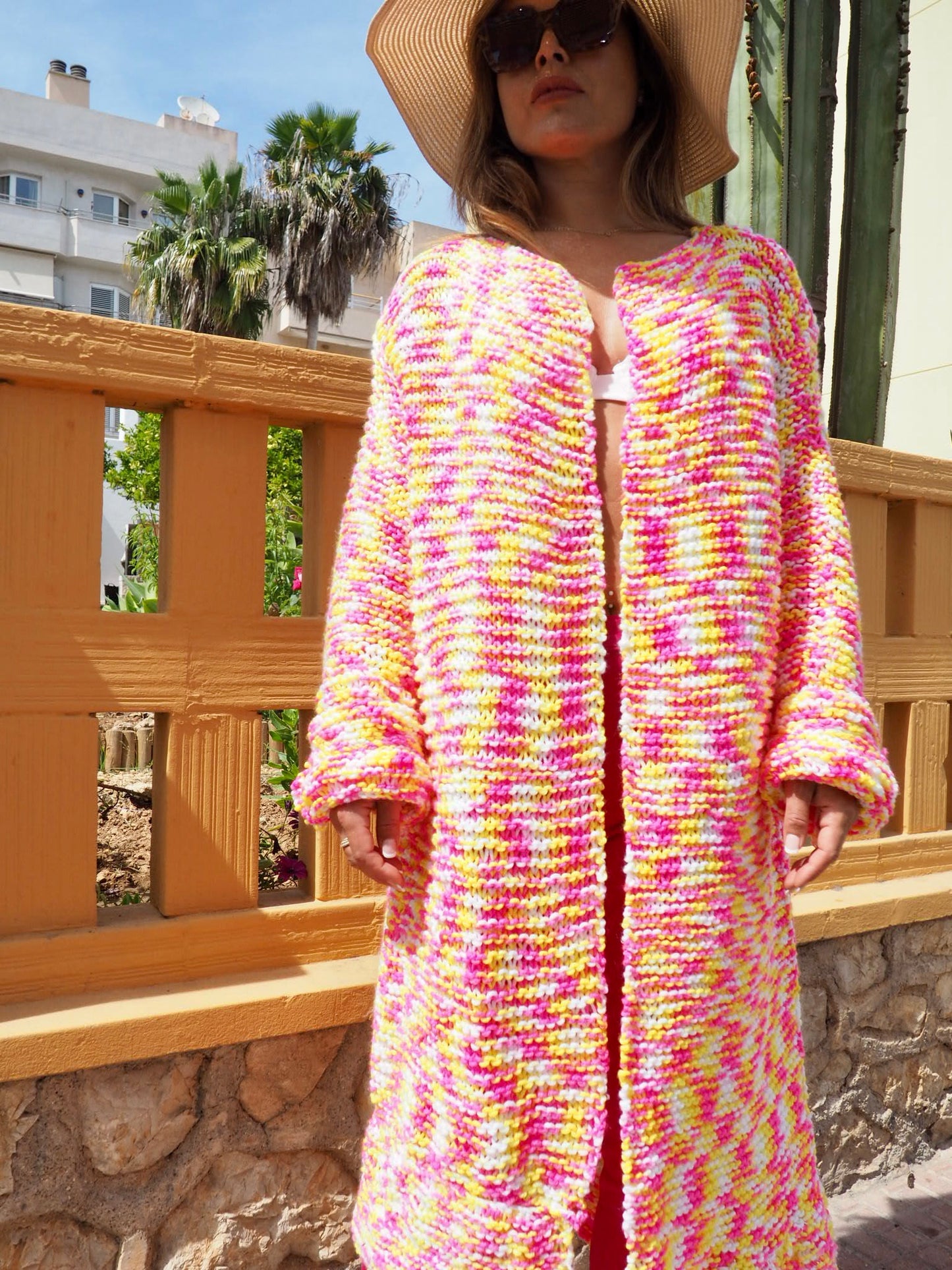 Hand knitted pink and yellow jacket made in ibiza by Vagabond Ibiza
