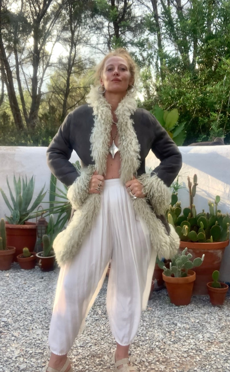 Vintage Classic 1970’s reversible Afghan sheepskin jacket has some small signs of ages some small hole’s