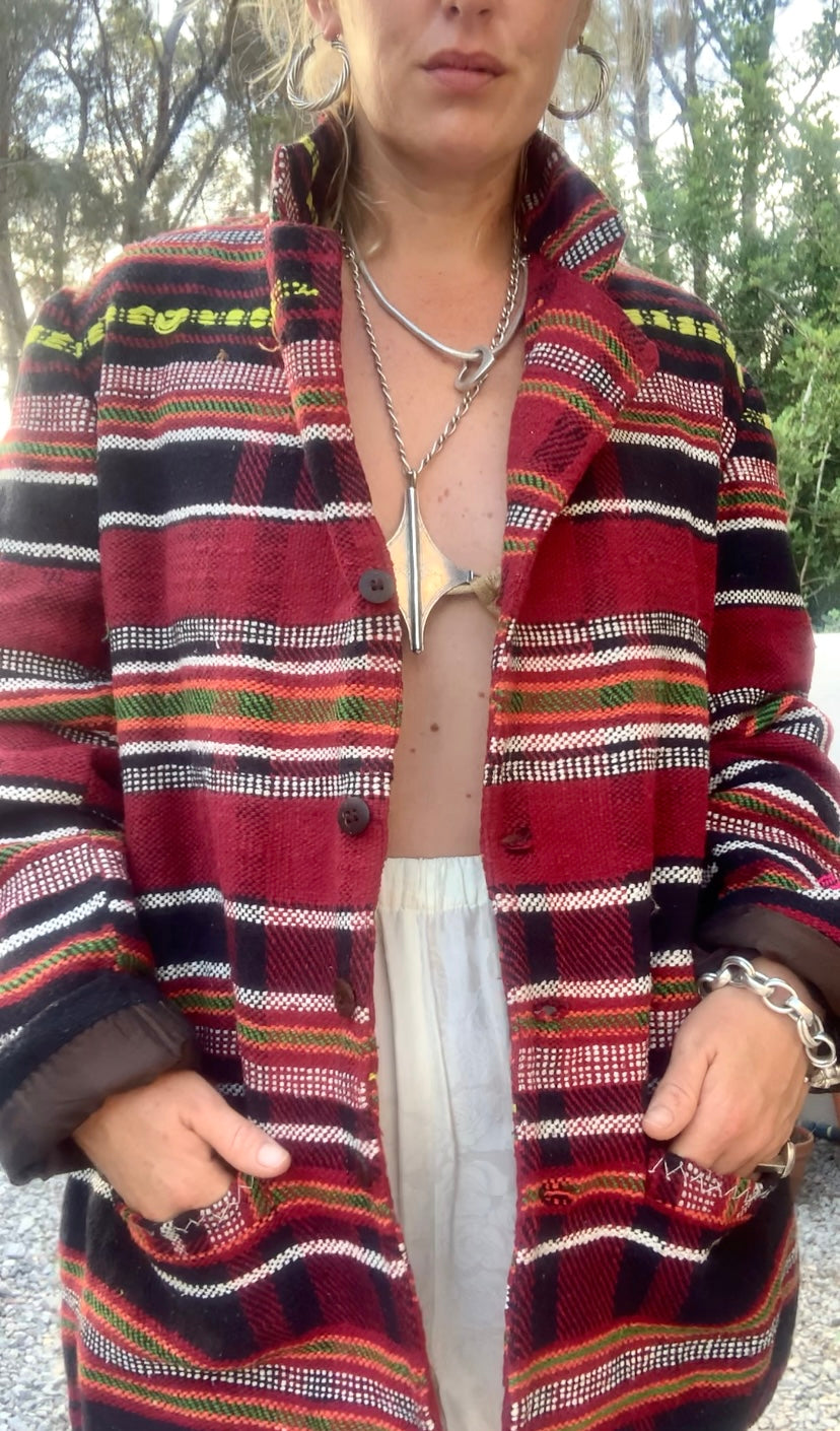Original vintage woven Moroccan blanket jacket with red and black stripped design pockets and buttons up the front lined with black cotton