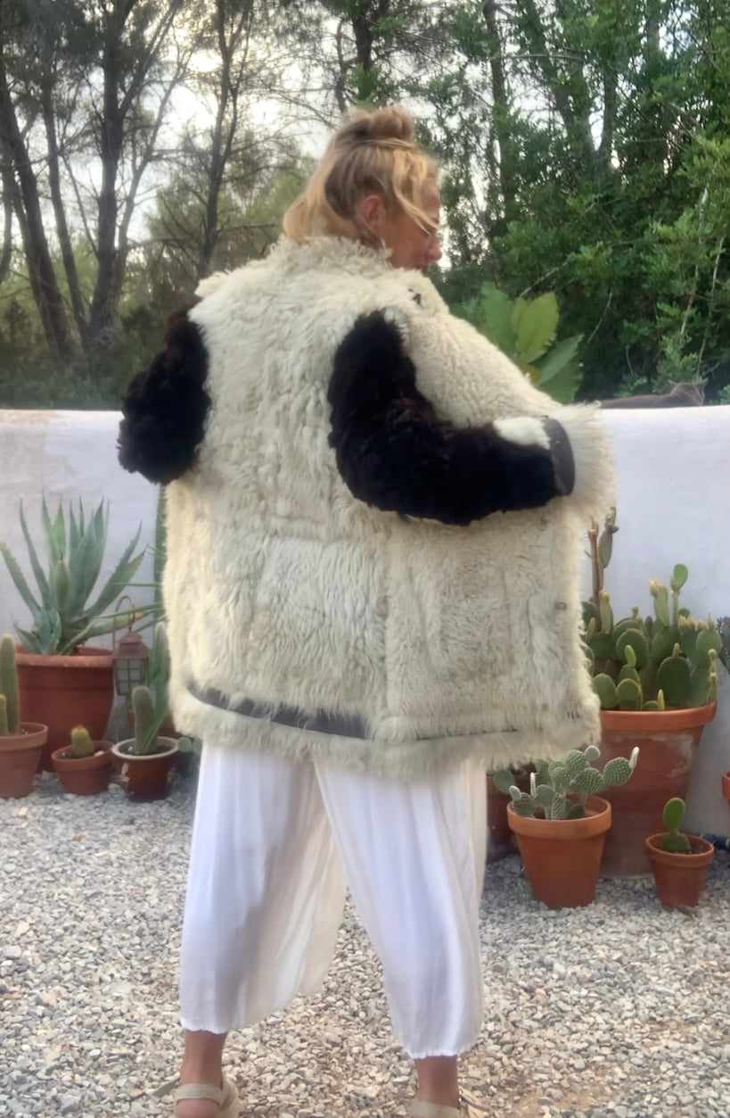 Vintage Classic 1970’s reversible Afghan sheepskin jacket has some small signs of ages some small hole’s