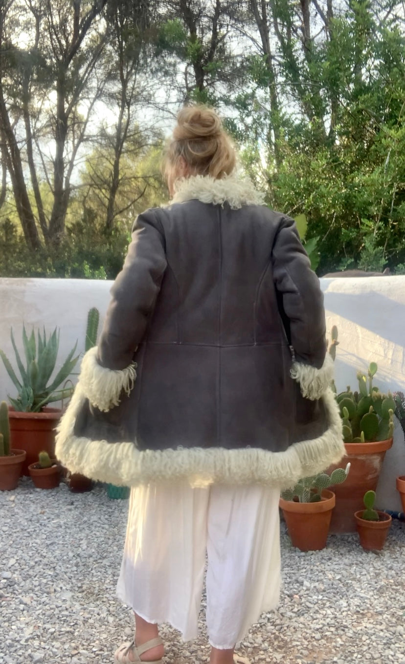 Vintage Classic 1970’s reversible Afghan sheepskin jacket has some small signs of ages some small hole’s