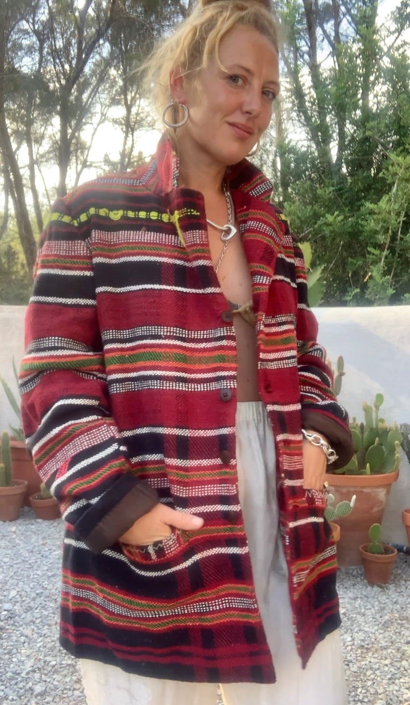 Original vintage woven Moroccan blanket jacket with red and black stripped design pockets and buttons up the front lined with black cotton
