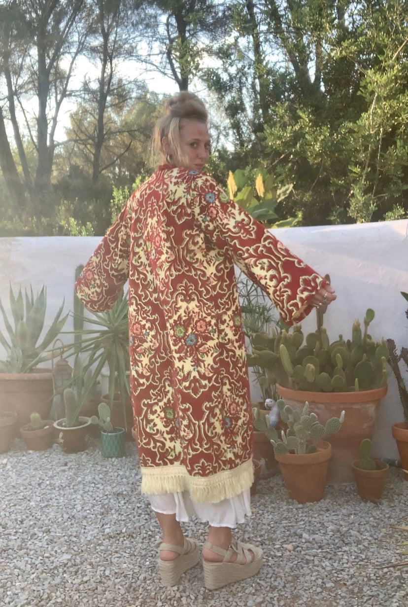 Vintage red and pastel yellow textiles with a burnet out devore Damascus pattern on the velvets pile very special textiles with tassel trim