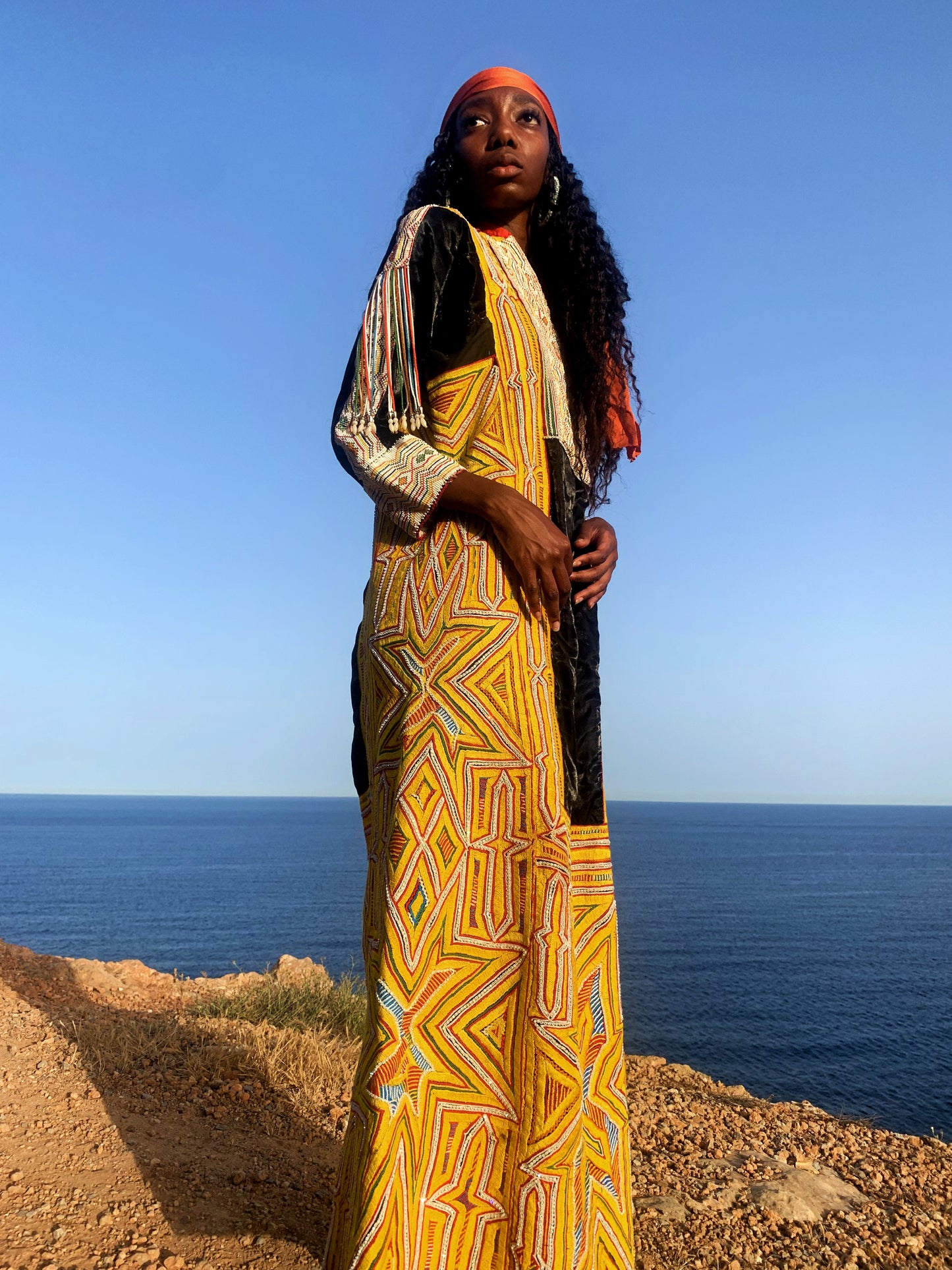 shop vintage online, affordable vintage clothing, vintage clothing store, vintage clothing brand, sustainable clothing brand, sustainable fashion, recycled fashion, slow fashion brand, recycled clothes, 70s vintage, bohemian vintage, affordable slow fashion, hippie boho, ethical fashion brand, embroidered dress, hand stitched, tribal dress, festival dress, African dress, African beadwork, vintage African, yellow vintage dress, yellow maxi dress, black and yellow dress