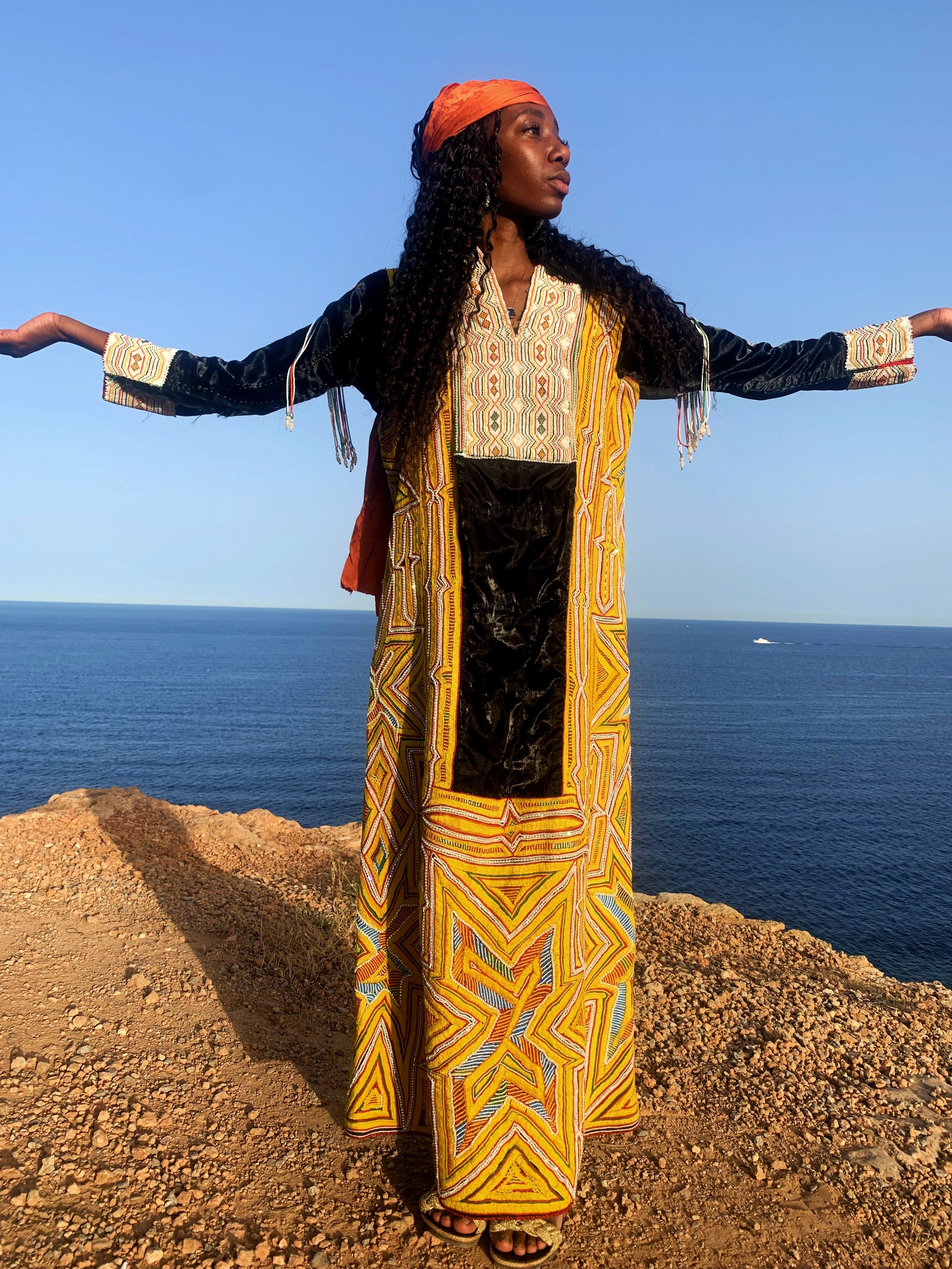 shop vintage online, affordable vintage clothing, vintage clothing store, vintage clothing brand, sustainable clothing brand, sustainable fashion, recycled fashion, slow fashion brand, recycled clothes, 70s vintage, bohemian vintage, affordable slow fashion, hippie boho, ethical fashion brand, embroidered dress, hand stitched, tribal dress, festival dress, African dress, African beadwork, vintage African, yellow vintage dress, yellow maxi dress, black and yellow dress