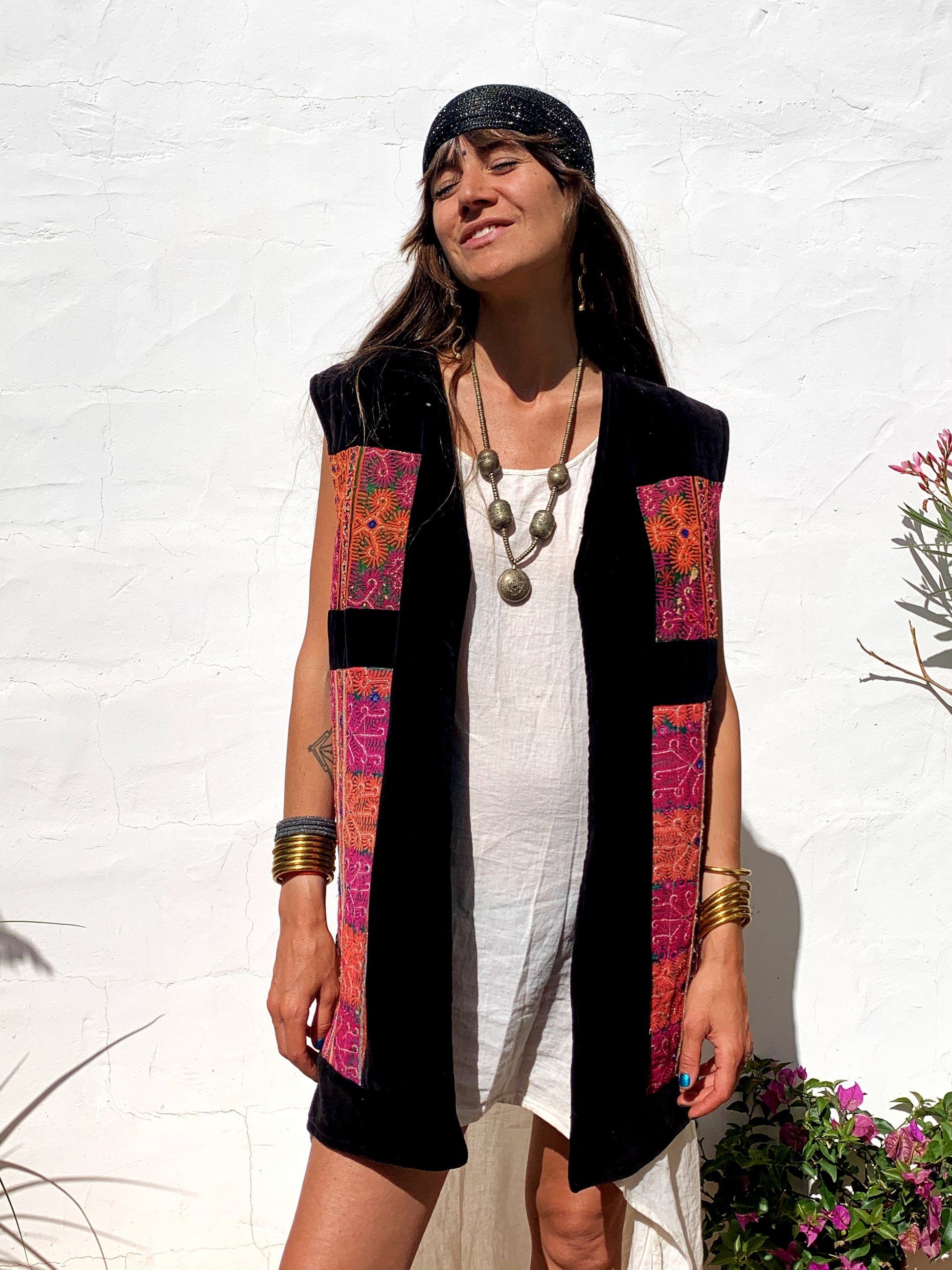 shop vintage online, affordable vintage clothing, vintage clothing store, vintage clothing brand, sustainable clothing brand, sustainable fashion, recycled fashion, slow fashion brand, recycled clothes, 70s vintage, bohemian vintage, affordable slow fashion, hippie boho, ethical fashion brand, embroidered, hand stitched, tribal waistcoat, festival fashion, Afghan waistcoat, Indian embroidery, vintage Indian , velvet waistcoat, black waistcoat 