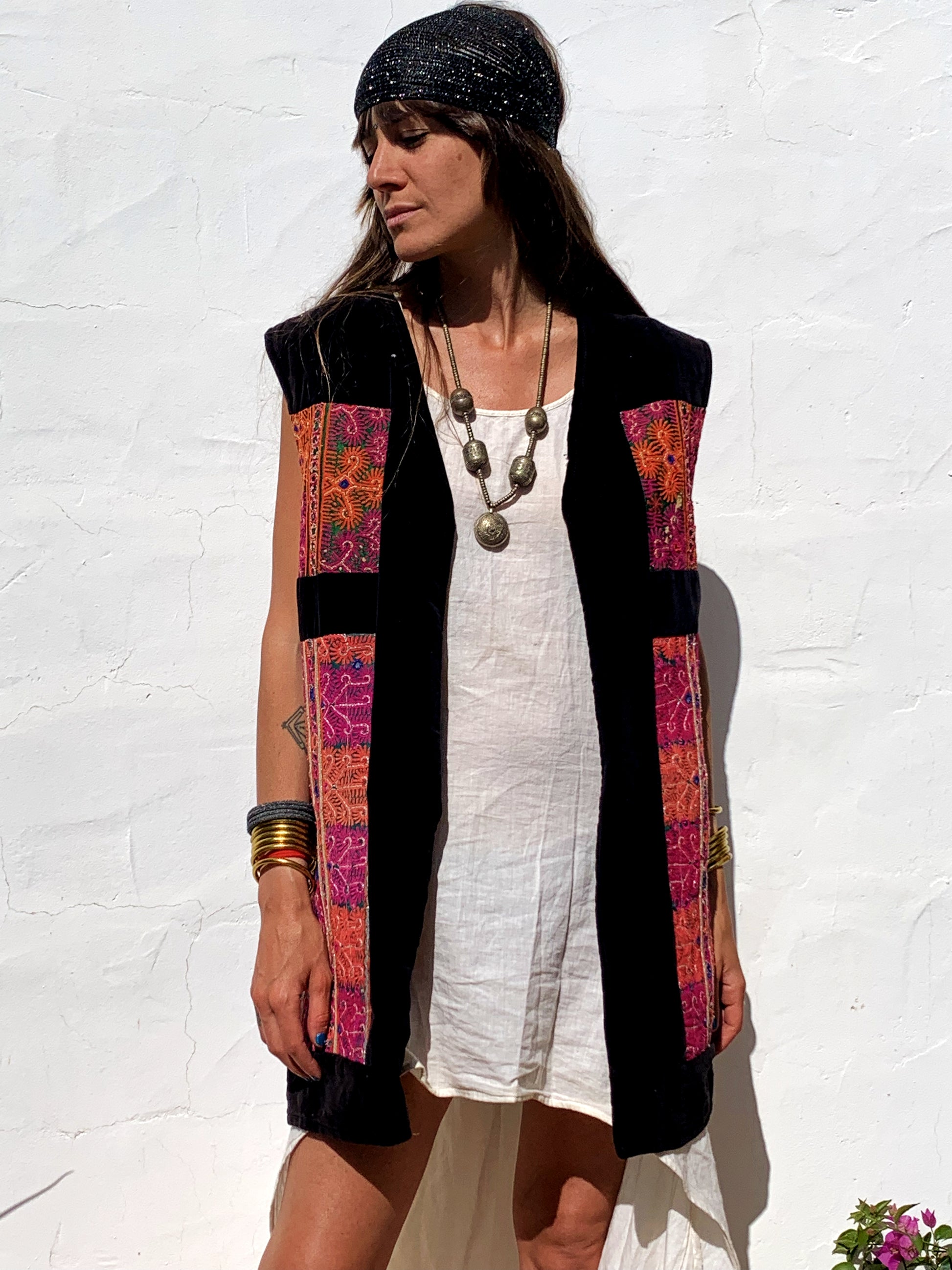 shop vintage online, affordable vintage clothing, vintage clothing store, vintage clothing brand, sustainable clothing brand, sustainable fashion, recycled fashion, slow fashion brand, recycled clothes, 70s vintage, bohemian vintage, affordable slow fashion, hippie boho, ethical fashion brand, embroidered, hand stitched, tribal waistcoat, festival fashion, Afghan waistcoat, Indian embroidery, vintage Indian , velvet waistcoat, black waistcoat 
