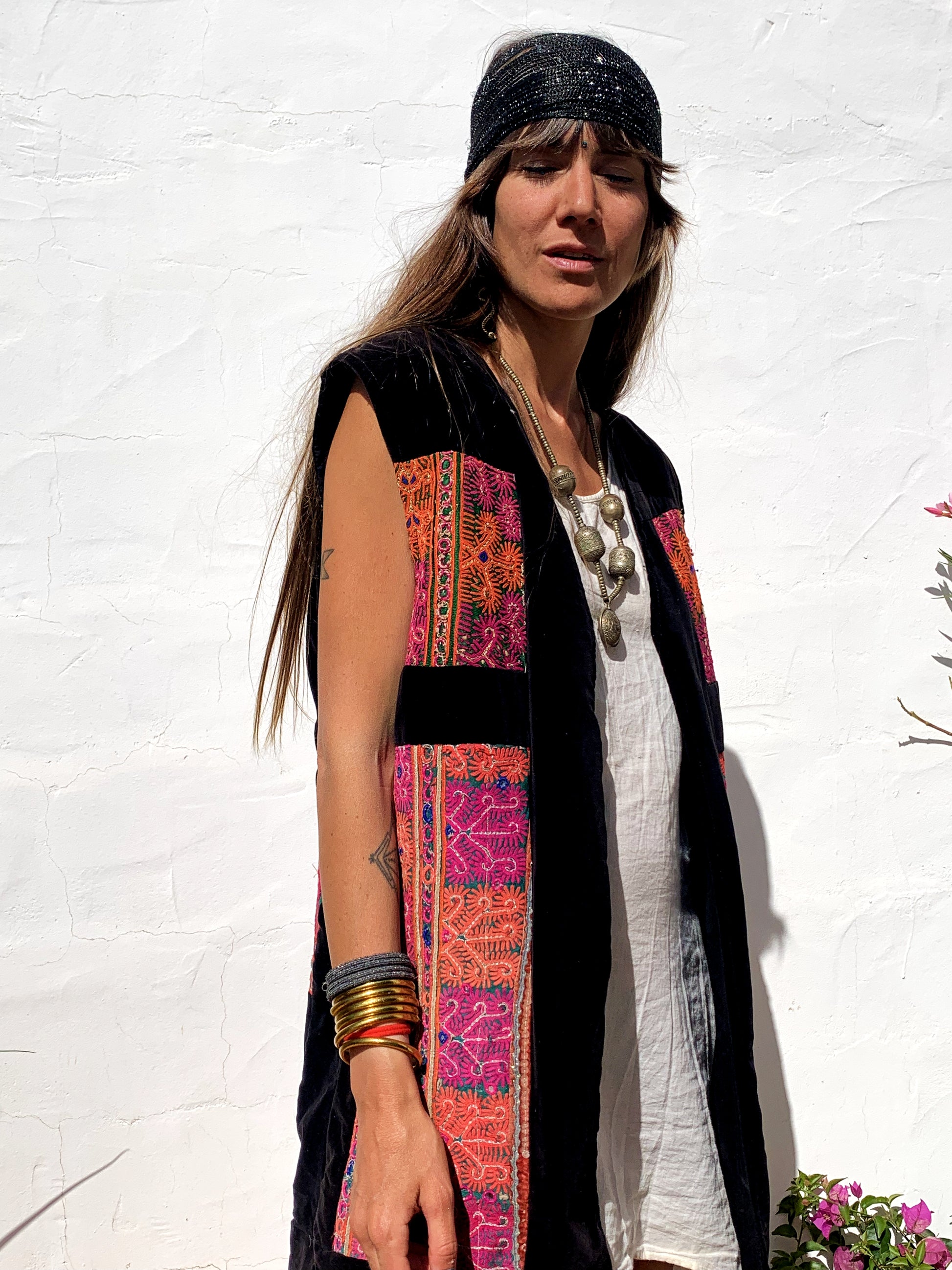 shop vintage online, affordable vintage clothing, vintage clothing store, vintage clothing brand, sustainable clothing brand, sustainable fashion, recycled fashion, slow fashion brand, recycled clothes, 70s vintage, bohemian vintage, affordable slow fashion, hippie boho, ethical fashion brand, embroidered, hand stitched, tribal waistcoat, festival fashion, Afghan waistcoat, Indian embroidery, vintage Indian , velvet waistcoat, black waistcoat 