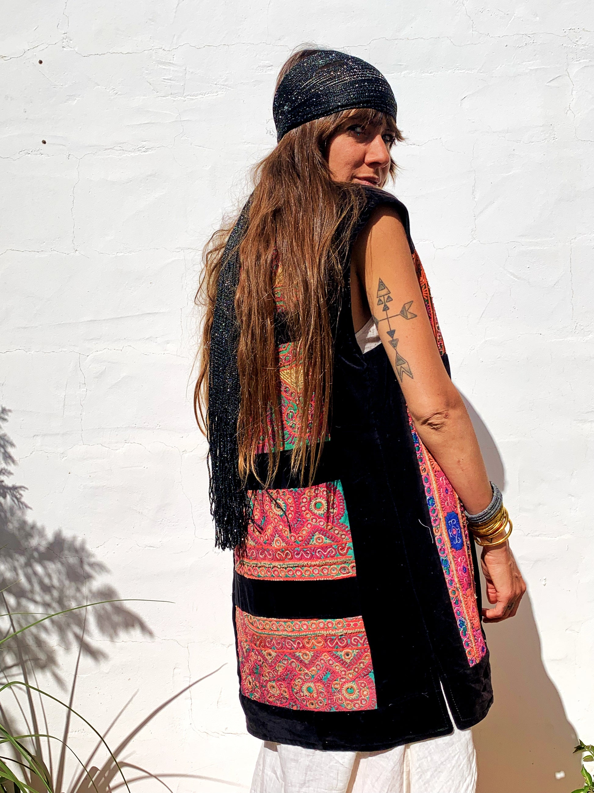 shop vintage online, affordable vintage clothing, vintage clothing store, vintage clothing brand, sustainable clothing brand, sustainable fashion, recycled fashion, slow fashion brand, recycled clothes, 70s vintage, bohemian vintage, affordable slow fashion, hippie boho, ethical fashion brand, embroidered, hand stitched, tribal waistcoat, festival fashion, Afghan waistcoat, Indian embroidery, vintage Indian , velvet waistcoat, black waistcoat 