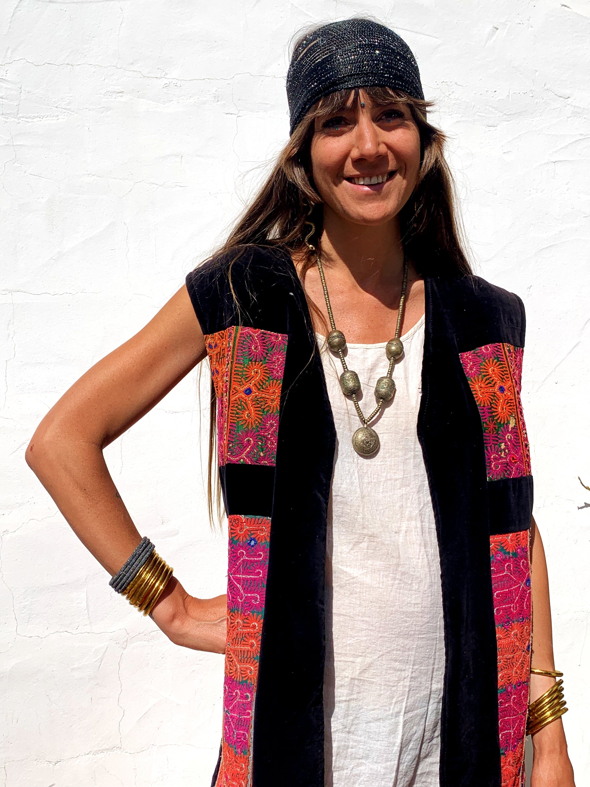 shop vintage online, affordable vintage clothing, vintage clothing store, vintage clothing brand, sustainable clothing brand, sustainable fashion, recycled fashion, slow fashion brand, recycled clothes, 70s vintage, bohemian vintage, affordable slow fashion, hippie boho, ethical fashion brand, embroidered, hand stitched, tribal waistcoat, festival fashion, Afghan waistcoat, Indian embroidery, vintage Indian , velvet waistcoat, black waistcoat , 