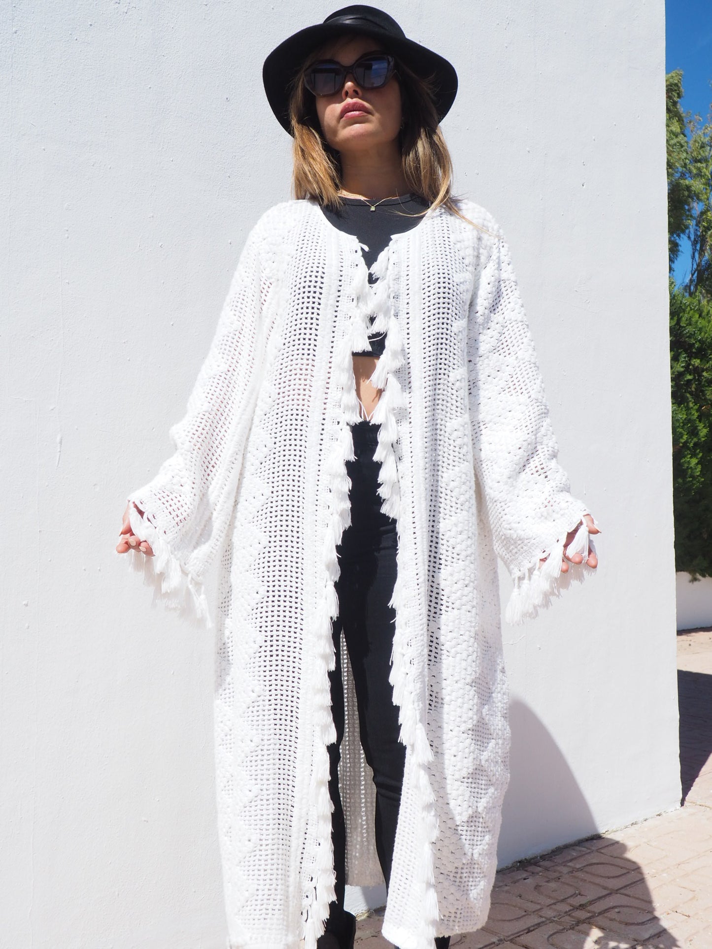 Unique on off a kind vintage white crochet jacket up-cycled by Vagabond Ibiza with cute tássel details.