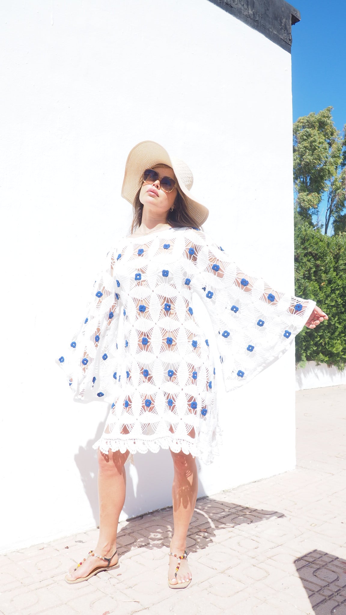 Amazing handmade vintage crochet textiles up-cycled bell sleeve dress with blue flower details by Vagabond Ibiza