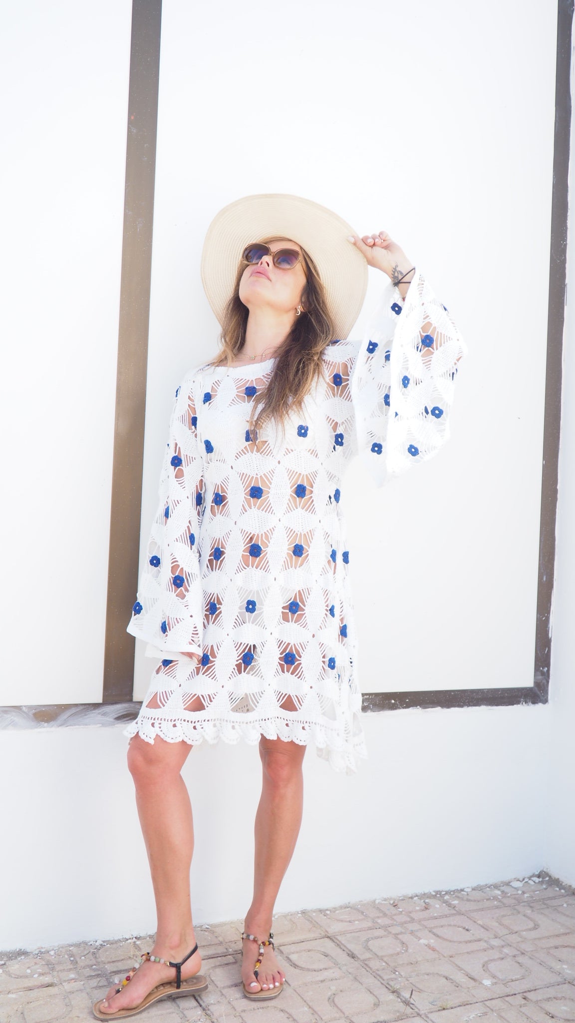 Amazing handmade vintage crochet textiles up-cycled bell sleeve dress with blue flower details by Vagabond Ibiza