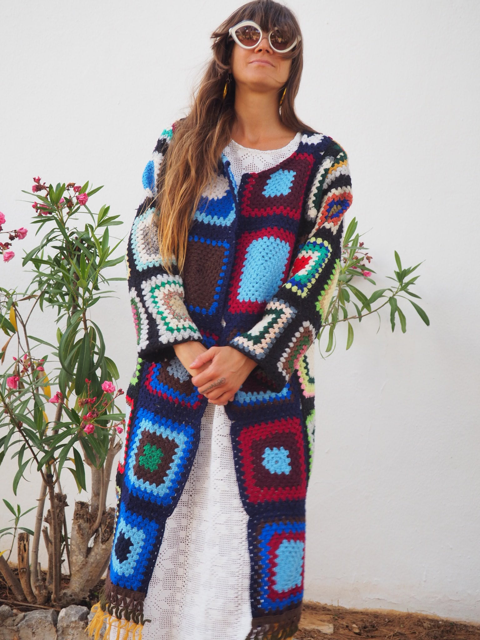 Granny Square Crochet Jacketcolourful waistcoat, Vintage Crochet Jacket, up cycled jacket , handmade jacket, striped jacket , vintage jacket, 1970s jacket , long waistcoat, slow fashion , sustainable fashion, vintage shop, ibiza vintage shop, ibiza style, bohemian jacket, boho jacket, colourful jacket, festival jacket, hippie style, 70s clothing, original vintage, recycled fashion brand, sustainable fashion brand, slow fashion brand, rainbow fashion, knitted jacket, woven jacket, winter jacket