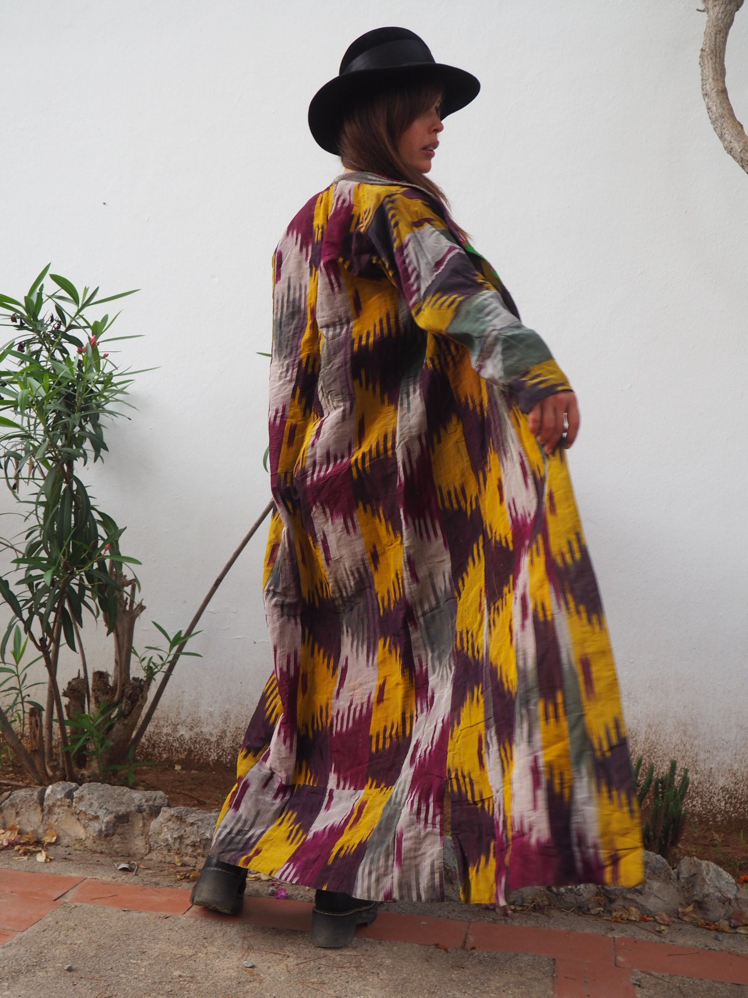 shop vintage online, affordable vintage clothing, vintage clothing store, vintage clothing brand, sustainable clothing brand, sustainable fashion, recycled fashion, slow fashion brand, recycled clothes, 70s vintage, bohemian vintage, affordable slow fashion, hippie boho, ethical fashion brand, Uzbekistan jacket, silk jacket, reversible jacket, antique textiles, long jacket, vintage jacket, vintage silk jacket, ikat silk, ikat jacket