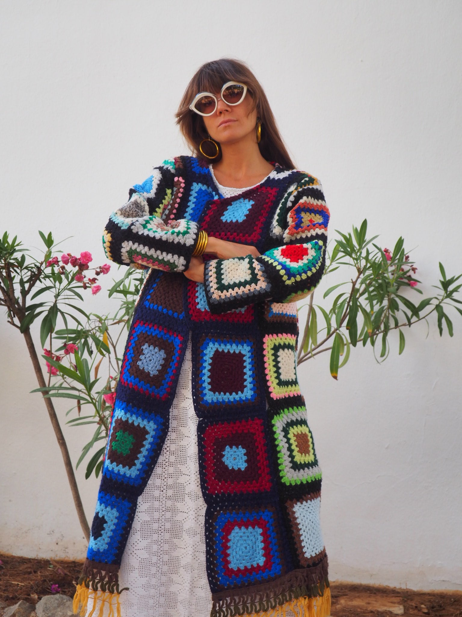 Granny Square Crochet Jacket,colourful waistcoat, Vintage Crochet Jacket, up cycled jacket , handmade jacket, striped jacket , vintage jacket, 1970s jacket , long waistcoat, slow fashion , sustainable fashion, vintage shop, ibiza vintage shop, ibiza style, bohemian jacket, boho jacket, colourful jacket, festival jacket, hippie style, 70s clothing, original vintage, recycled fashion brand, sustainable fashion brand, slow fashion brand, rainbow fashion, knitted jacket, woven jacket, winter jacket