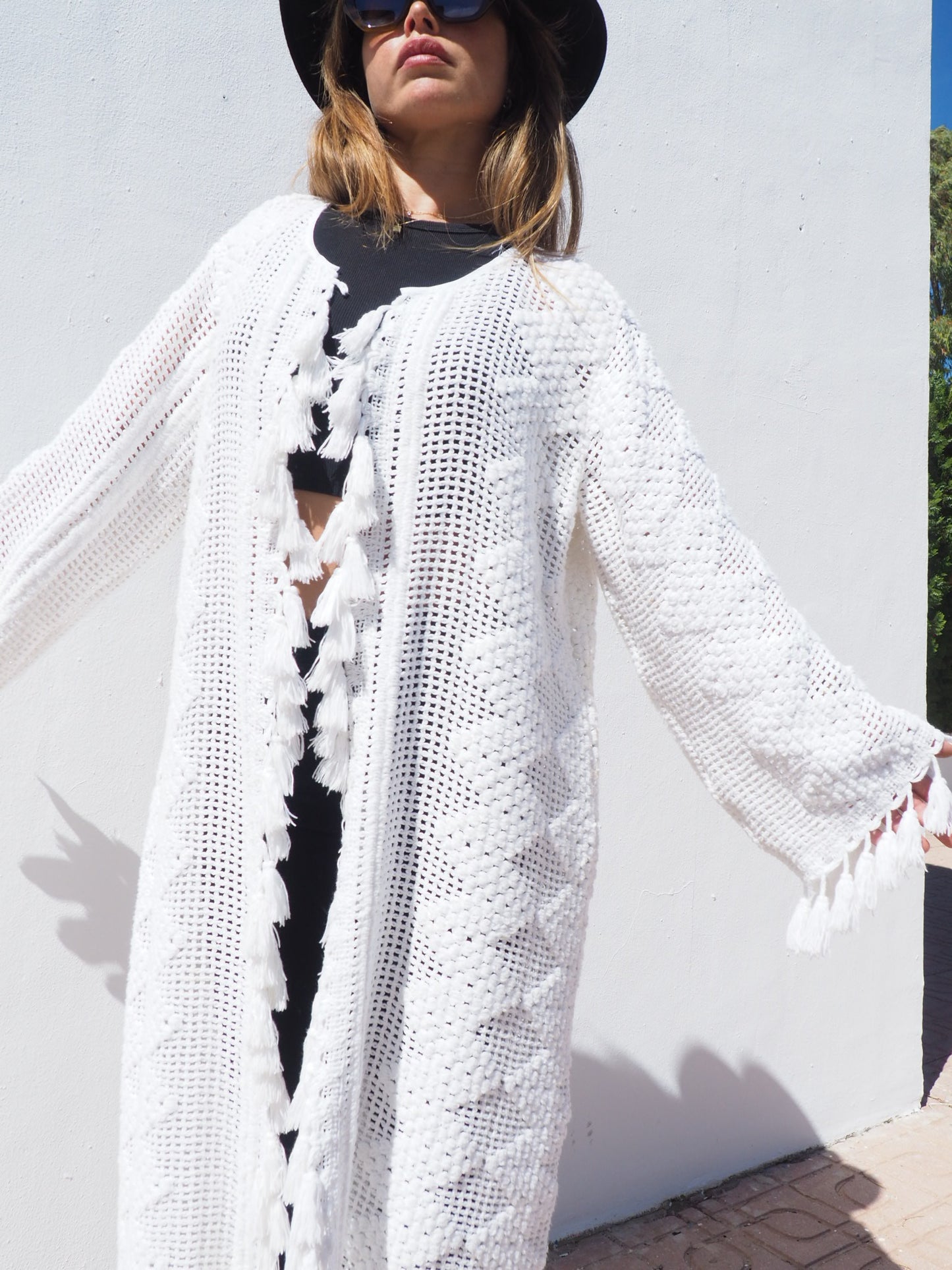 Unique on off a kind vintage white crochet jacket up-cycled by Vagabond Ibiza with cute tássel details.