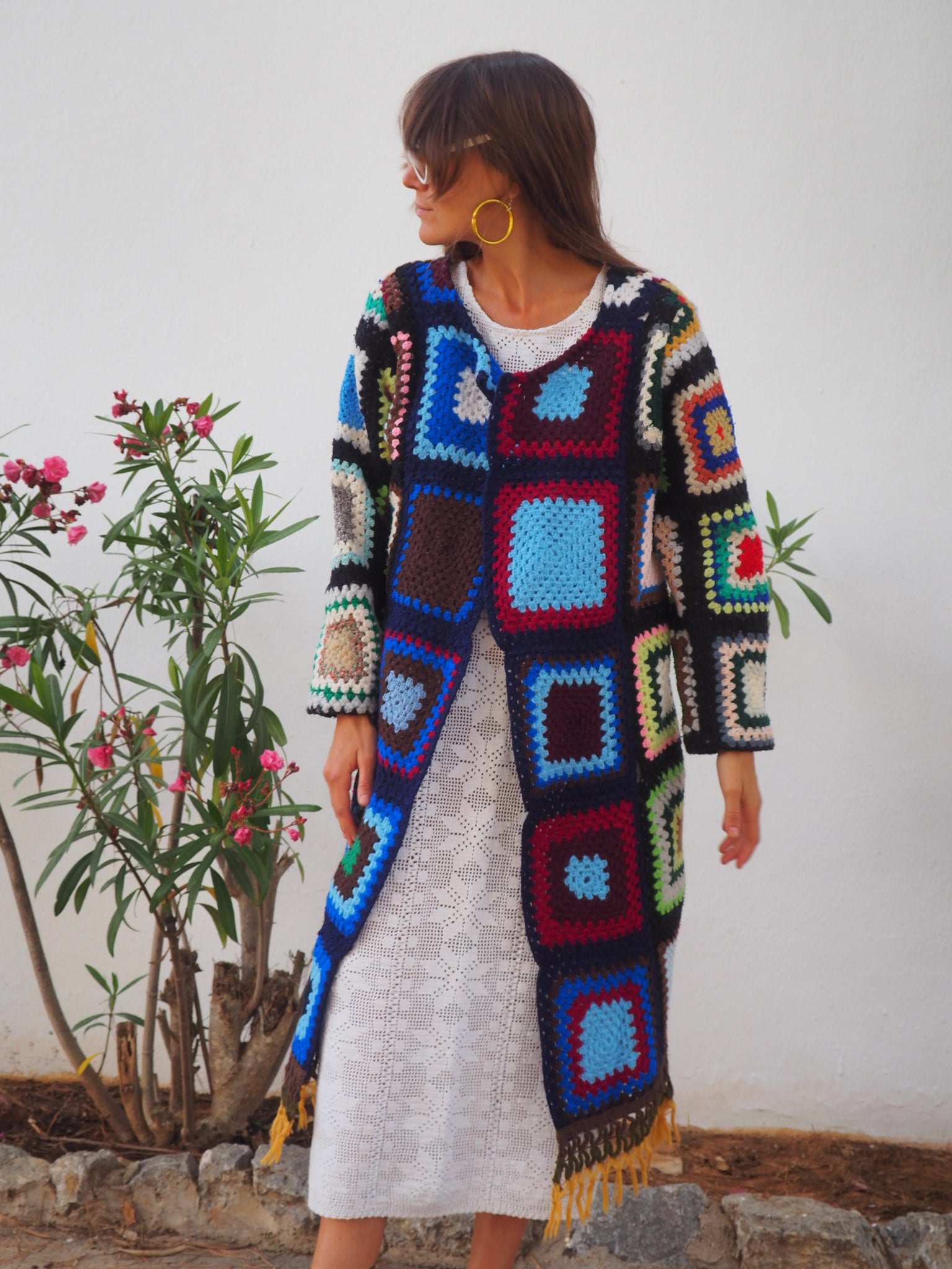 Vintage Granny Square Crochet Jacket,colourful waistcoat, Vintage Crochet Jacket, up cycled jacket , handmade jacket, striped jacket , vintage jacket, 1970s jacket , long waistcoat, slow fashion , sustainable fashion, vintage shop, ibiza vintage shop, ibiza style, bohemian jacket, boho jacket, colourful jacket, festival jacket, hippie style, 70s clothing, original vintage, recycled fashion brand, sustainable fashion brand, slow fashion brand, rainbow fashion, knitted jacket, woven jacket, winter jacket
